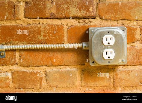 electrical box in brick|electrical outlet for brick wall.